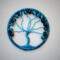 Blue Tree of Life suncatcher with crackle glass beads, wire branches, and a yarn-wrapped hoop. Handmade by Beneath the Oak Designs